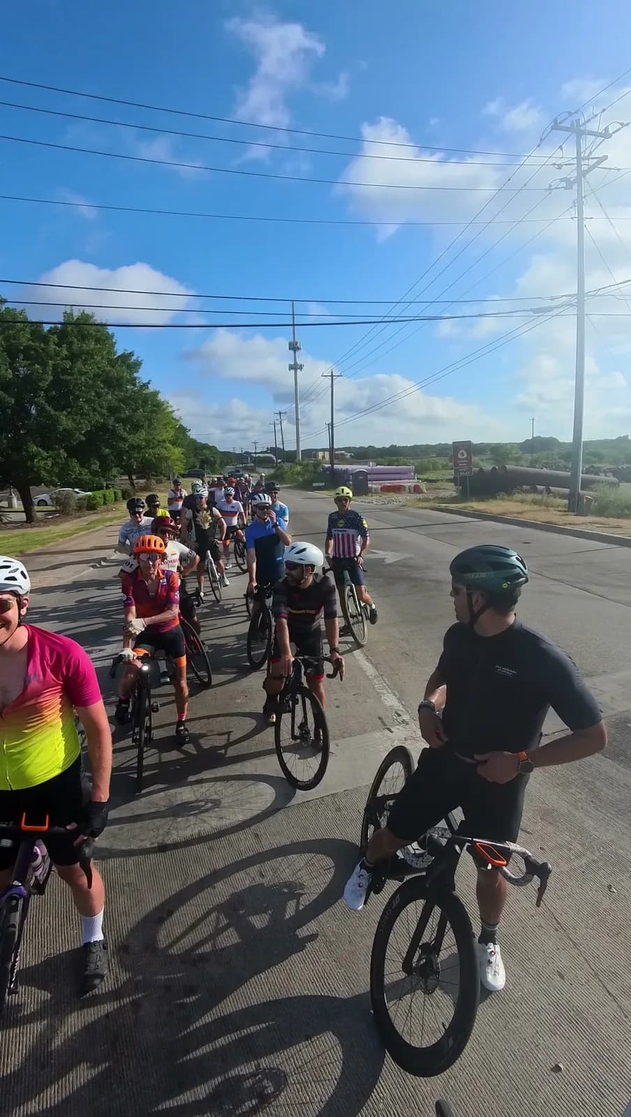 Rollout from the start of a July morning ride out of Austin, the pack lined up at the intersection