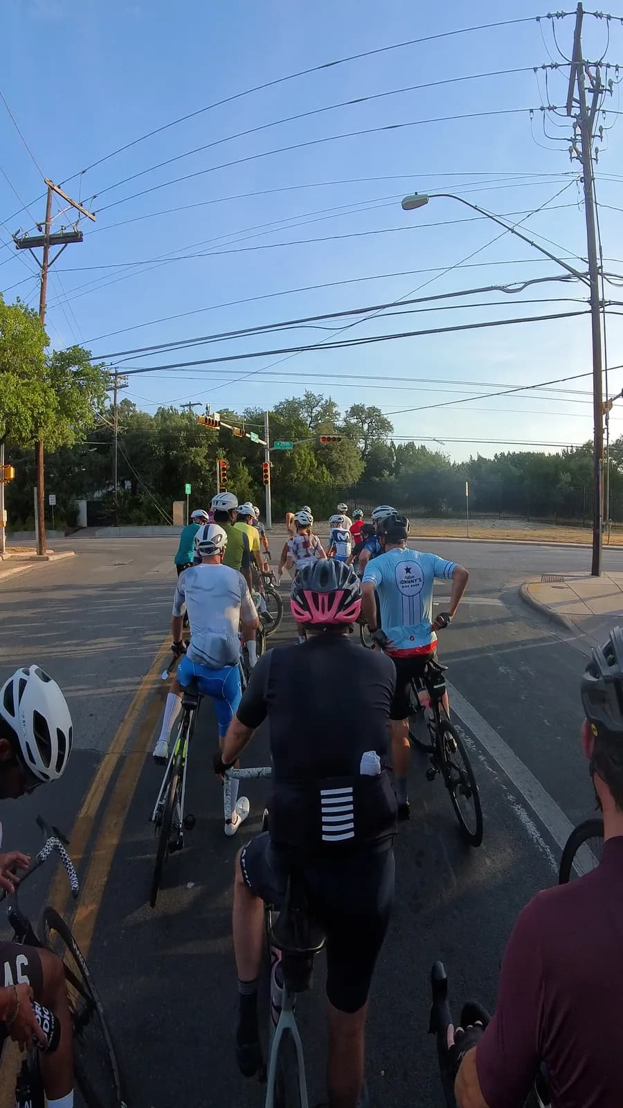 The group waiting at the light on a north Austin road