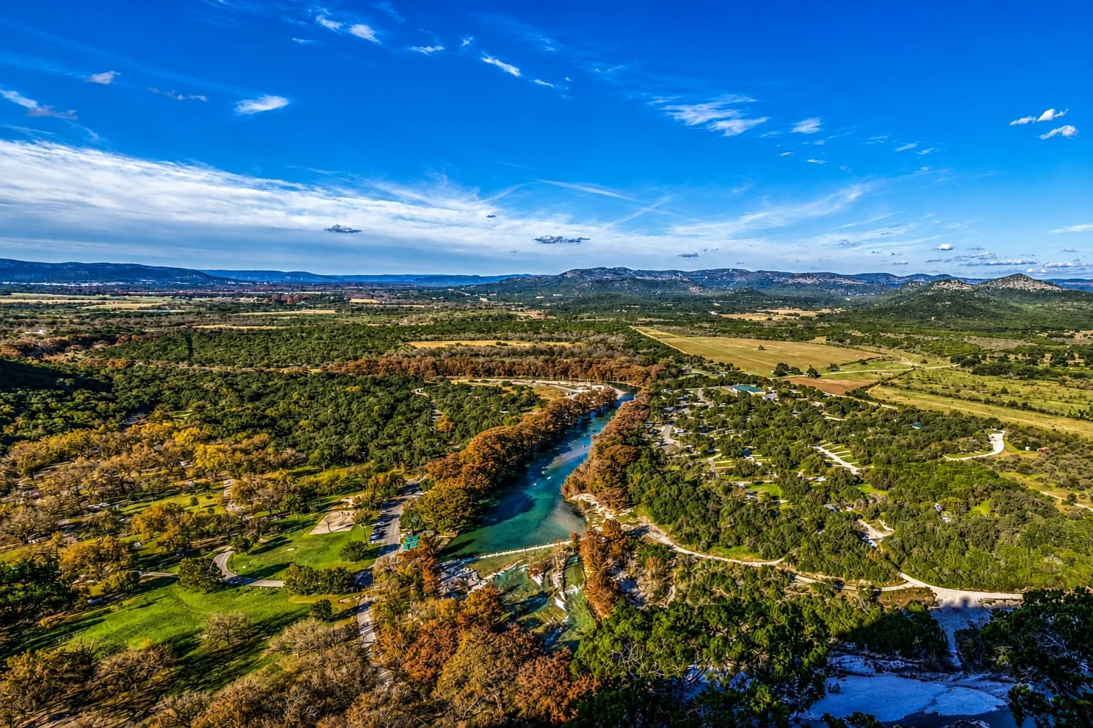 Aerial view of a Hill Country river through the trees