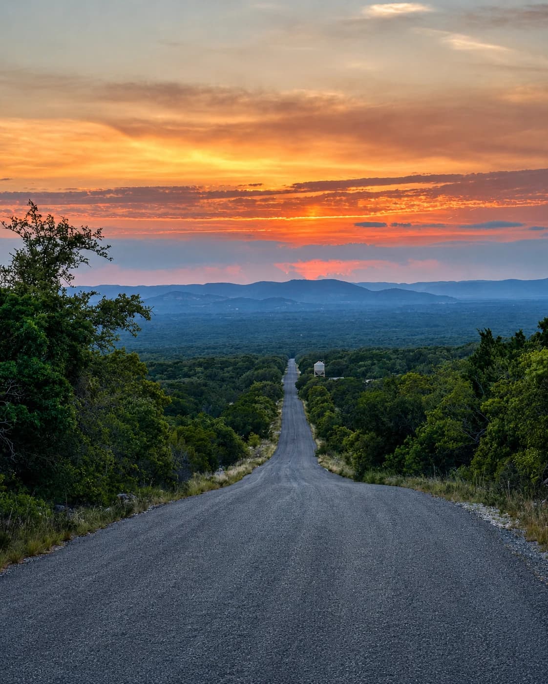 Hill Country country road at sunset
